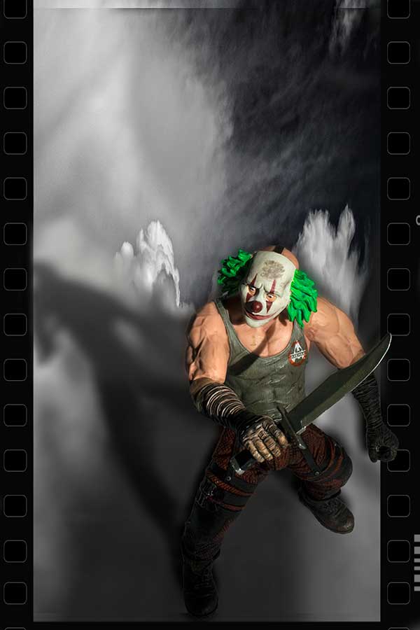 Insane clown with knife