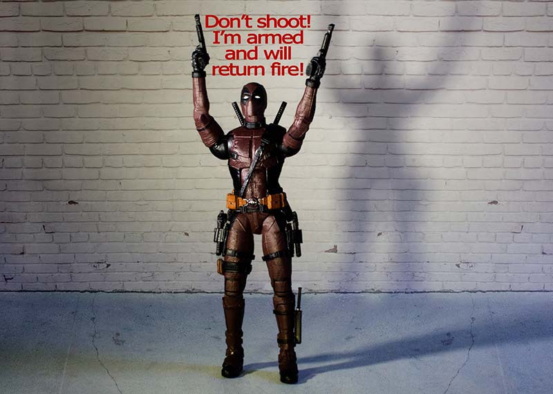 Deadpool with arms up